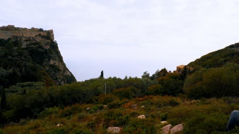 Greece,-Corfu:-The-video-captures-the-coastline-of-Corfu-Island-and-the-fortress-atop-a-mountain,-offering-stunning-coastal-views