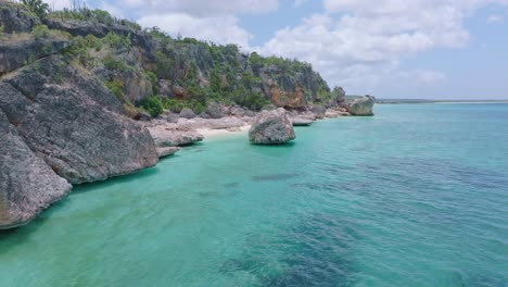 Rocks-and-boulder-with-beach-at-Jaragua-National-park-coastline-in-Dominican-Republic