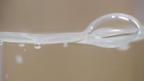 Slow-motion-footage-of-water-splashes-in-bottle