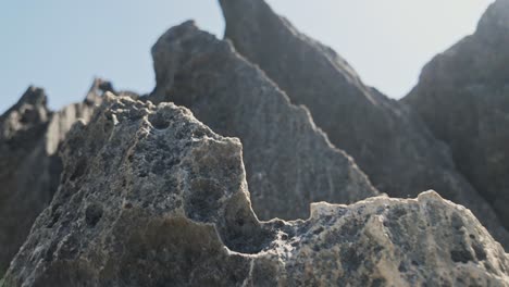 Grey-karst-limestone-cliffs-with-steep-furrowed-slopes