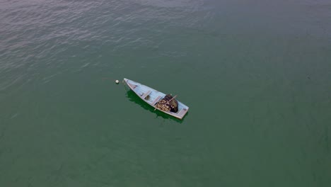 Overhead-view-of-lonely-fishing-boat-in-the-ocean