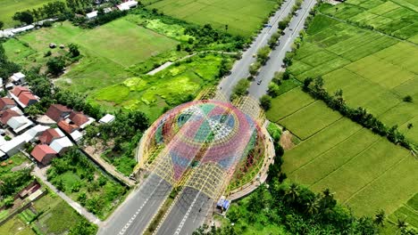 Aerial-view-of-colorful-building-named-Tembolak-Gateway-on-the-Lombok-highway