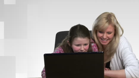 Mother-helping-Child-on-Computer