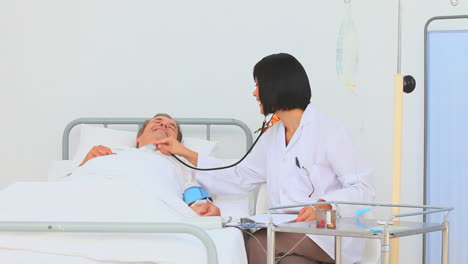 A-nurse-using-a-stethoscope-