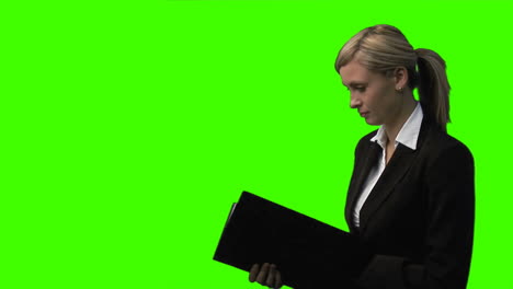 Confident-Businesswoman-with-Folder