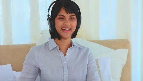 Asian-woman-listening-to-music-