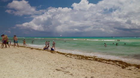 Serene-Beach-Day-at-Playa-Del-Carmen-Mexico-with-dramatic-cumulus-clouds-overhead