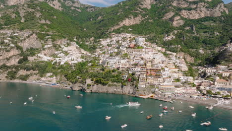 Panoramic-drone-shot-of-Positano-in-Amalfi-coast,-Italy-during-a-sunny-day