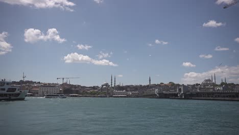 Ships,-ferries,-boats,-historical-buildings-in-the-Bosphorus,-Istanbul,-Turkiye