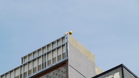 Construction-Worker-Doing-Masonry-Work-On-The-Exterior-Of-A-New-Building