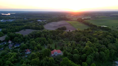 Panorama,-morning-rays-of-the-rising-sun-falling-on-a-picturesque-rural-landscape