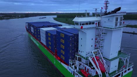 Cargo-Vessel-with-full-load-of-containers-makes-way-along-Oude-Maas