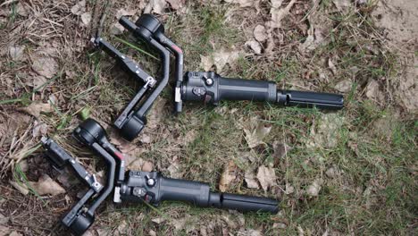 Electronic-gimbal-stabilizers-for-digital-camera-equipment-on-outdoor-ground