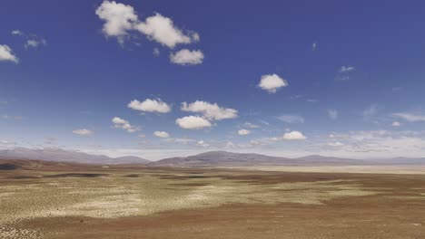 Aerial-Drone-Pan-Over-The-Landscape-Near-Salinas-Grandes-of-Jujuy-and-Salta-Provinces,-Argentina