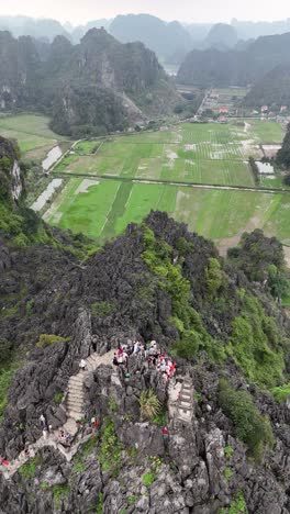 Aerial-View-of-Mua-Caves-Staircase,-Ninh-Binh,-Vietnam,-vertical-approaching-shot