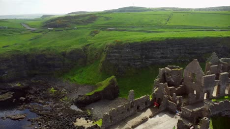 Aerial-shot-of-Dunluce-Castle,-in-Bushmills-on-the-North-County-Antrim-coast-in-Northern-Ireland