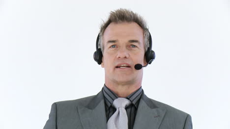 Businessman-with-headset-talking