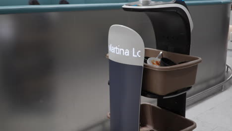 Smart-Technology-Robot-Moving-Collected-Dirty-Dishes-for-Washing-at-Martina-Lounge,-Incheon-Airport,-South-Korea