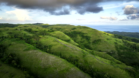 Hills-with-cloudy-sky,-Nusa-Penida,-Bali-in-Indonesia