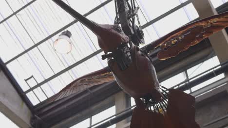 Low-angle-view-of-a-huge-mechanical-piece-of-Hummingbird-at-machines-of-the-Isle-of-Nantes-in-France
