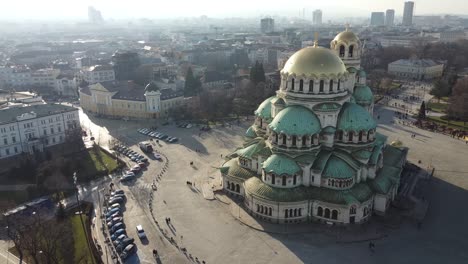 Aerial-orbital-drone-clip-circling-around-Alexander-Nevsky-Cathedral-clockwise-in-the-Winter-sun-in-Sofia,-Bulgaria