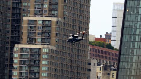 Helicopter-In-Slow-Motion-In-Front-Of-Residential-Building