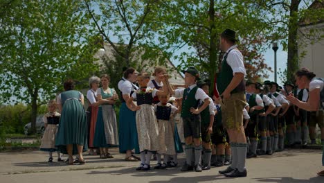 Bavarian-children-preparing-a-traditional-maypole-dance