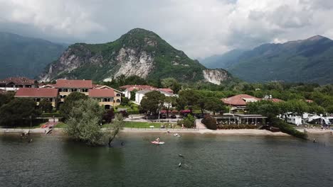 A-Warm-Spring-Afternoon-on-the-Feriolo-Lakeside-Beach,-Lake-Maggiore