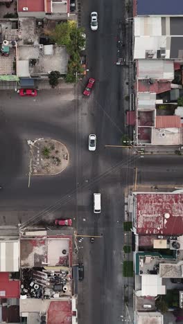 Aerial-view-of-a-typical-street-in-Ecatepec,-vertical-mode