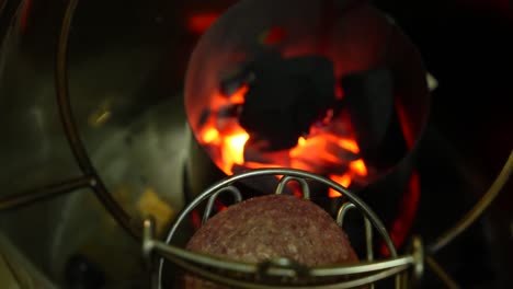 Beef-Patty-Being-Grilled-on-a-Small-Barrel-Grill