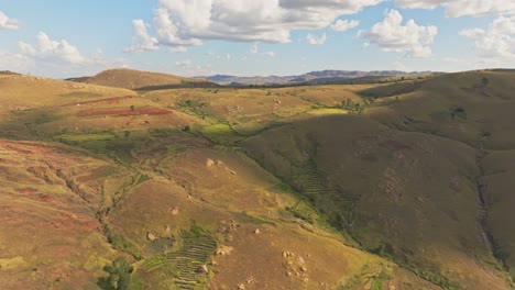 Panoramic-view-on-beautiful-green-mountains-with-in-Madagascar-rural-countryside-after-rainy-season-on-sunny-day