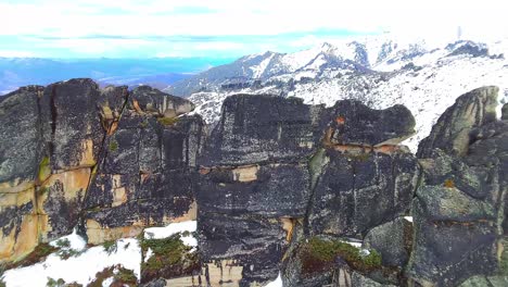 Aerial-footage-of-snow-covered-rocky-mountains