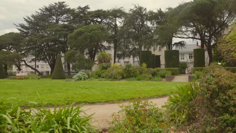 Square-Maurice-Schwob-in-Nantes,-France-with-manicured-gardens-and-pathways-on-a-cloudy-day