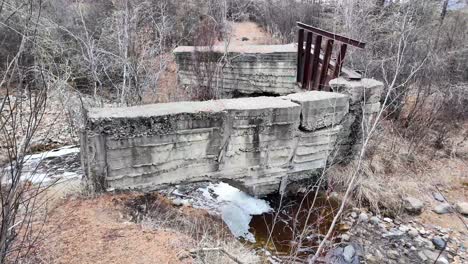 A-crumbling-concrete-bridge-in-the-forest