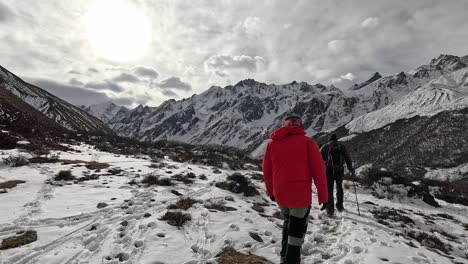 Following-hikers-crossing-glacial-moraine-plains