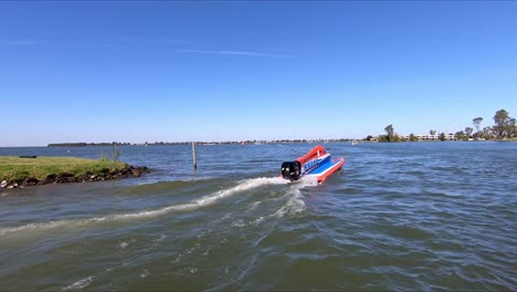 High-speed-boat-heading-out-from-the-lagoon-at-the-Mulwala-Ski-Club-to-race-in-a-professional-competition-on-Lake-Mulwala