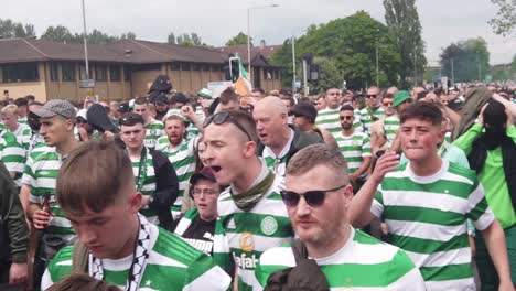 Slow-motion-of-Celtic-fans-heading-to-Hampden-Park-for-he-Scottish-Cup-Final-against-Rangers