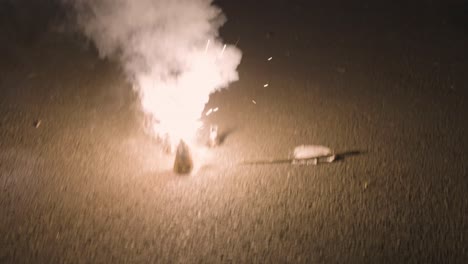 young-kid-burning-Flowerpots-or-indian-Anaar-fireworks-during-the-Diwali-festival-celebration-video-is-taken-at-jodhpur-rajasthan-india-on-Nov-20-2023