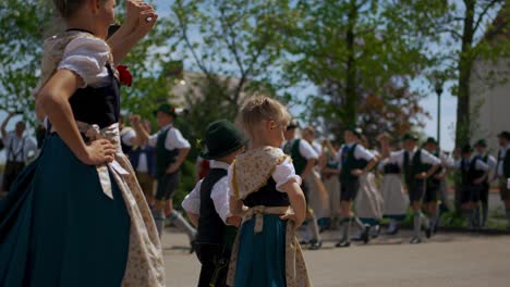 Young-men-lifting-a-traditional-Bavarian-maypole