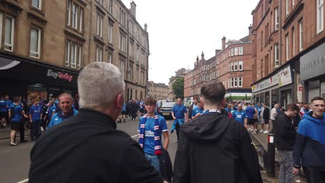 There-is-a-wide-shot-of-Ranger-fans-heading-to-Hampden-for-the-Scottish-Cup-Final-against-Celtic
