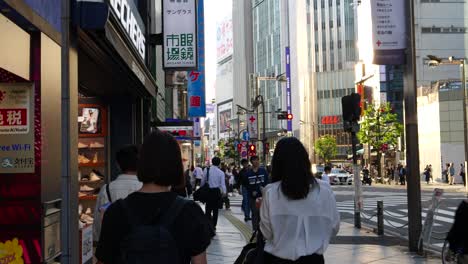 POV-walking-in-slow-motion-through-streets-of-Shinjuku