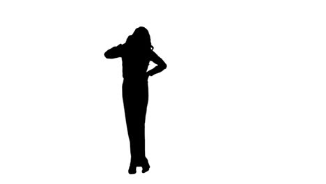 Silhouette-woman-talking-on-her-mobile-phone