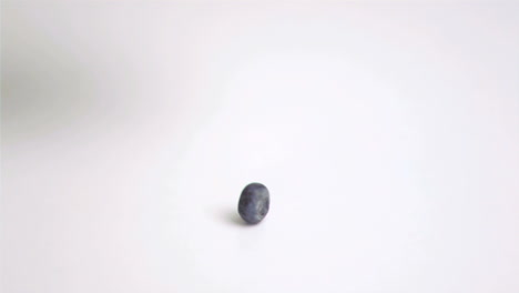 Blueberry-falling-in-super-slow-motion