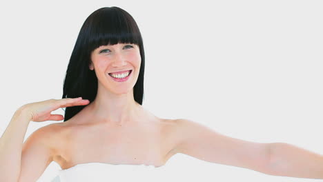 Smiling-woman-massaging-her-arm