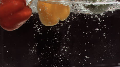 Peppers-diving-into-water-in-super-slow-motion
