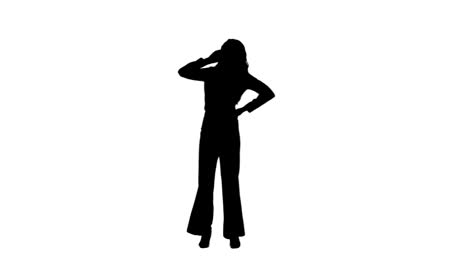 A-silhouette-of-a-woman-talking-on-a-mobile-phone