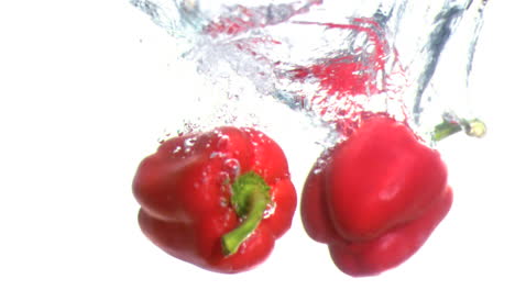 Peppers-falling-into-water-in-super-slow-motion