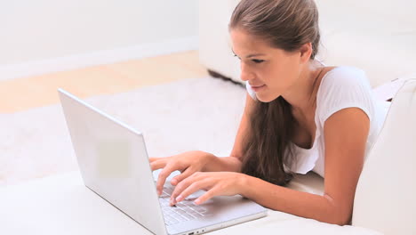 Woman-typing-on-her-laptop