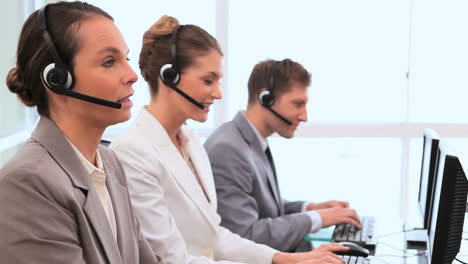 Call-centre-agents-working-with-computers