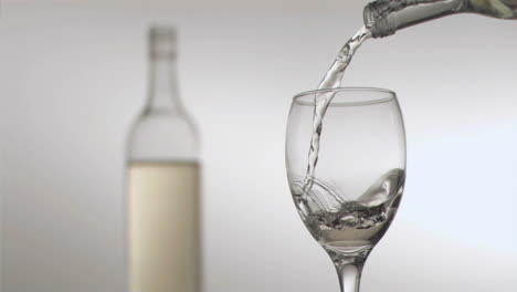 White-wine-being-poured-in-super-slow-motion